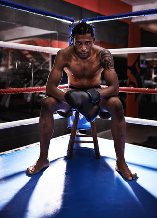 He trains hard to be the best. a young african american boxer.の写真素材
