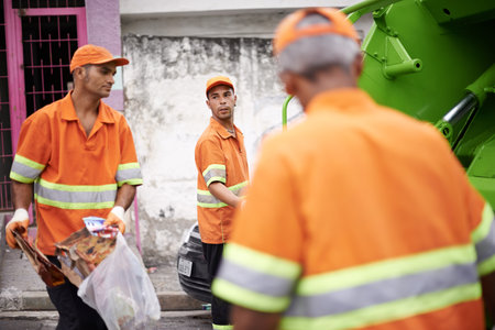 Garbage collection day. a garbage collection team at work.