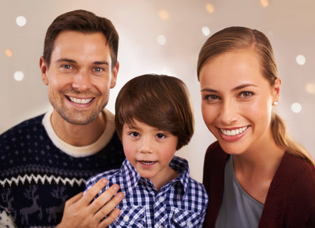 Theyre the perfect little family. Portrait of a happy young family.