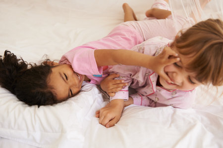 I LOVE sleepovers. cute little girls having a sleepover.の写真素材