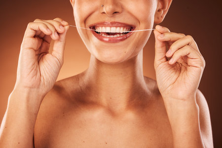 Teeth, zoom and woman with floss for dental cleaning, teeth whitening and healthy mouth protection...
