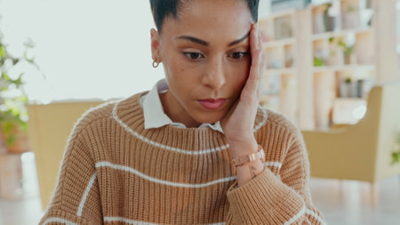 Stress, mental health and woman frustrated with copywriting, blogging and an email letter error, problem or mistake. Doubtful, sad and depressed journalist editor typing a research report on laptopの写真素材