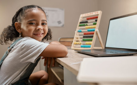 Laptop, mockup or girl learning math at home via elearning or online class for numbers education or...