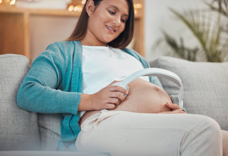 Relax, pregnancy music and woman with a smile for podcast for child in stomach, streaming audio and...