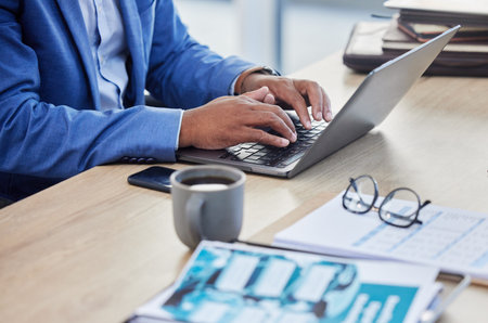 Business man, hands and typing on laptop keyboard while working in accounting office for finance...