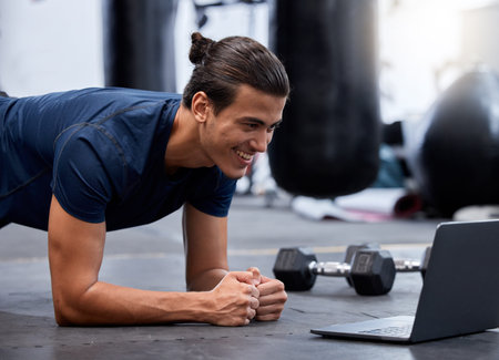 Exercise, laptop and personal trainer do virtual workout video on internet streaming or watching...