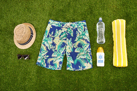 Mens casual summer fashion with accessories items, overhead top view. Marketing or advertising beach...