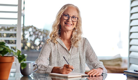It feel so good to work from the comfort of my home. Cropped portrait of an attractive senior...