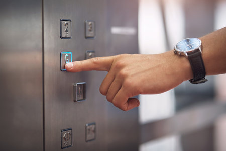 Where will you be heading to next. Closeup shot of an unrecognisable man pushing a button in an...