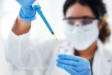 This might just work. a scientist conducting an experiment in a modern laboratory.