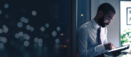 Finance, planning and businessman with a tablet for research, investment and mobile app with mockup space. Banner, accounting and employee with technology for financial innovation and economy growthの写真素材