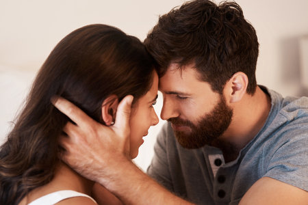 Its you and only you. an affectionate young couple sharing a romantic moment at home.の写真素材