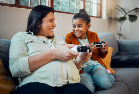 Mother, child and video game in home to relax together for happy family bonding on weekend....