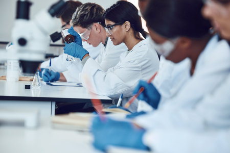 Science, education with students in lab for experiment, learning to be scientist and university with...