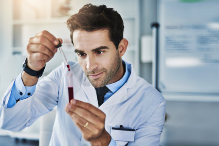 What a fascinating find. a scientist analyzing medical samples in a lab.の写真素材