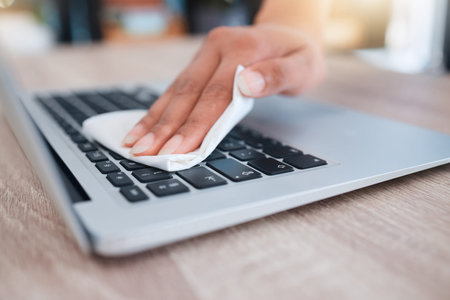 Woman, hands or laptop cleaning in home, house or office building for hygiene maintenance,...