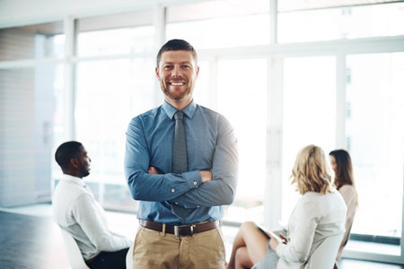 I couldnt have done it without them. Cropped portrait of a handsome young businessman standing with...