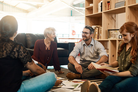We think different. a group of businesspeople having a brainstorming session while sitting on the...