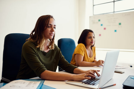 They are focused at the task at hand. creative employees working in a modern office.