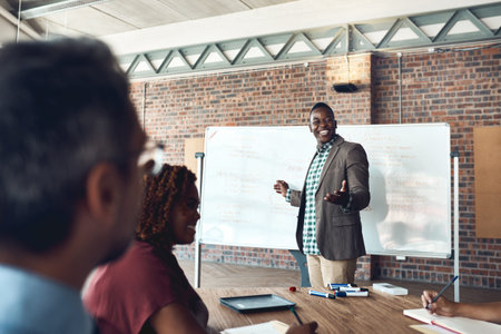 Working out what their business needs. a businessman giving a presentation to his colleagues in an...