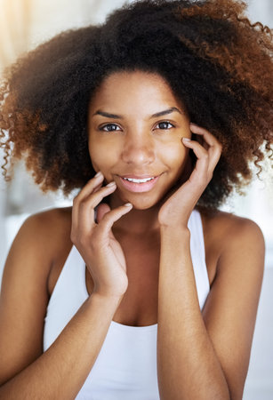 Natural beauty, the best kind of beauty. Portrait of an attractive young woman going through her...