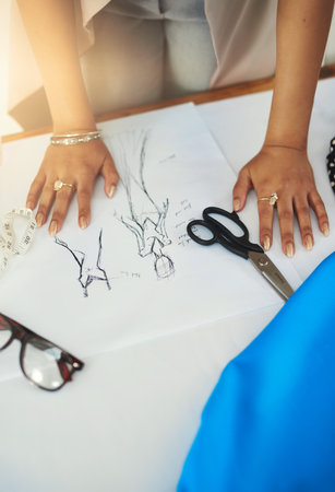 I draw fashion. a fashion designer working on a new design.の写真素材