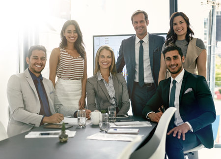 Presenting ideas to the team. corporate businesspeople meeting in the boardroom.