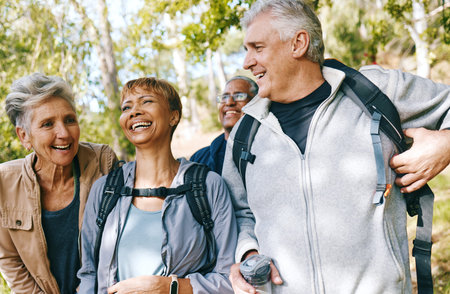Hiking, elderly and people, happy outdoor with nature, fitness and fun in park, exercise group...