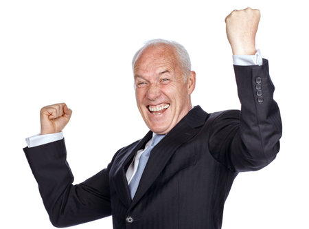 Victory is mine. Studio shot of an excited businessman celebrating a success.の写真素材