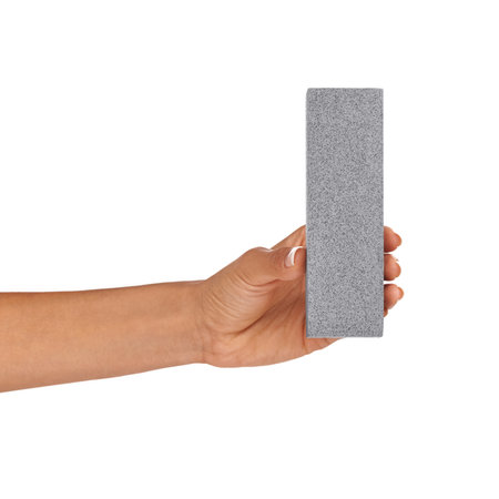 I know what this letter is. A young woman holding a capital letter I isolated on a white background.の写真素材