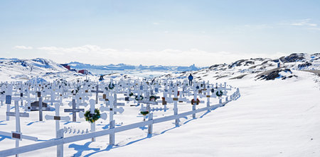 Greenland - beauty of the North. A photo of a churchyard outside Ilulissat, Greenland, DenmarkA...