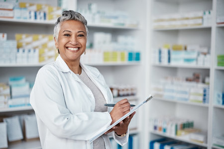 Pharmacy, woman and happy portrait with clipboard, checklist and inventory in Colombia. Happy pharmacist, manager and healthcare worker writing notes of professional retail, medical service and stockの写真素材