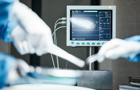 Electrocardiogram monitor, hands of doctors with scalpel for surgery, healthcare or medical support....