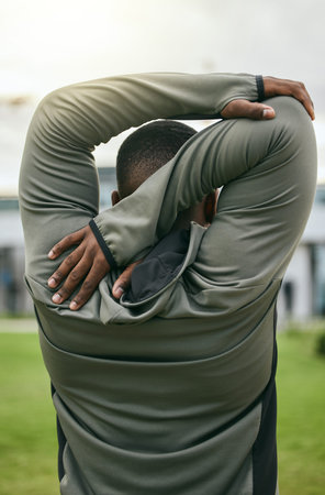 Fitness, back and stretching with a sports black man outdoor for a warm up before exercise or...