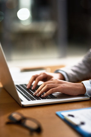 Where would business be without wireless technology. a businesswoman using a laptop at her desk in a...