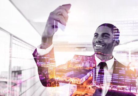 Adding a filter to his photograph. Multiple exposure shot of a young businessman taking a selfie.の写真素材