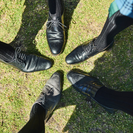 We have matching shoes guys. a group of unrecognizable mens formal dress shoes standing next to each...