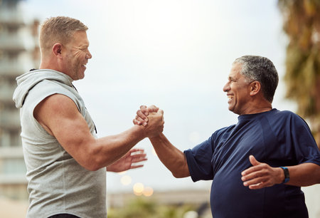 Old man, fitness and people handshake for health, lose weight or wellness thank you, support and accountability training, exercise or workout. Community friends, sports trust or teamwork hands shakeの写真素材