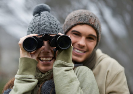 Taking in the views as the hike to the top. A young couple taking in all the scenery while enjoying...
