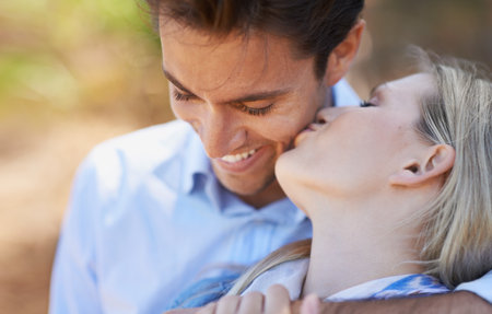 Youre the best. Closeup shot of a romantic young couple being affectionate in the outdoors.の写真素材