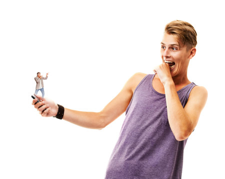 When technology becomes too real...A young man looking terrified at a person coming out of his...