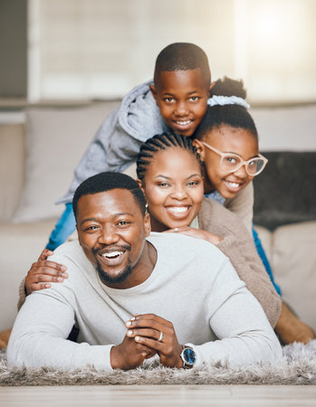 Hes our support. a young family relaxing together at home.
