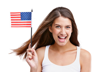 American flag, woman and happy portrait with mockup excited about labor day with white background. Isolated, model and happiness of young person smile about usa flag, pride and freedom with joyの写真素材