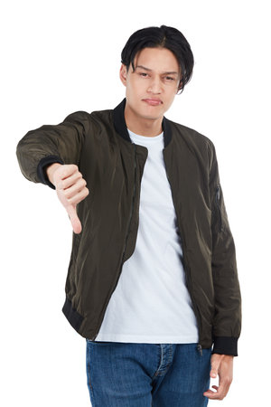Fail, thumbs down and portrait of man in studio isolated on white background. Dislike hand gesture,...