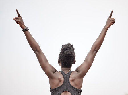 No one can take me down. a female athlete celebrating her run.の写真素材