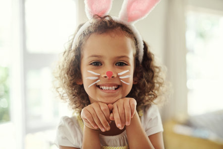 I will hop hop away. a cute little girl acting like a bunny.