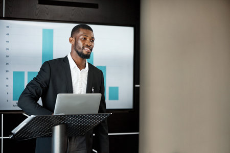 Blowing minds half off like a promo code. a young businessman delivering a presentation during a conference.の写真素材