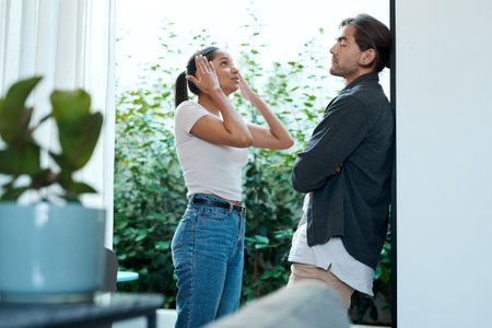 Youre so annoying. a young couple having an argument at home.