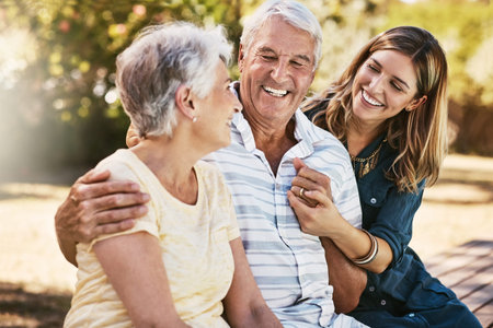 Family, park and woman with elderly parents outdoors, bonding and having fun. Love, support and...