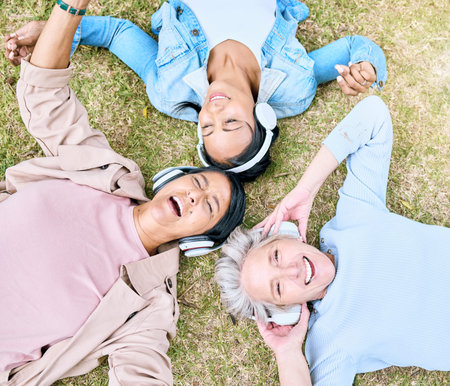 Top view, senior or women and music headphones in silent disco, retirement fun or bonding community...